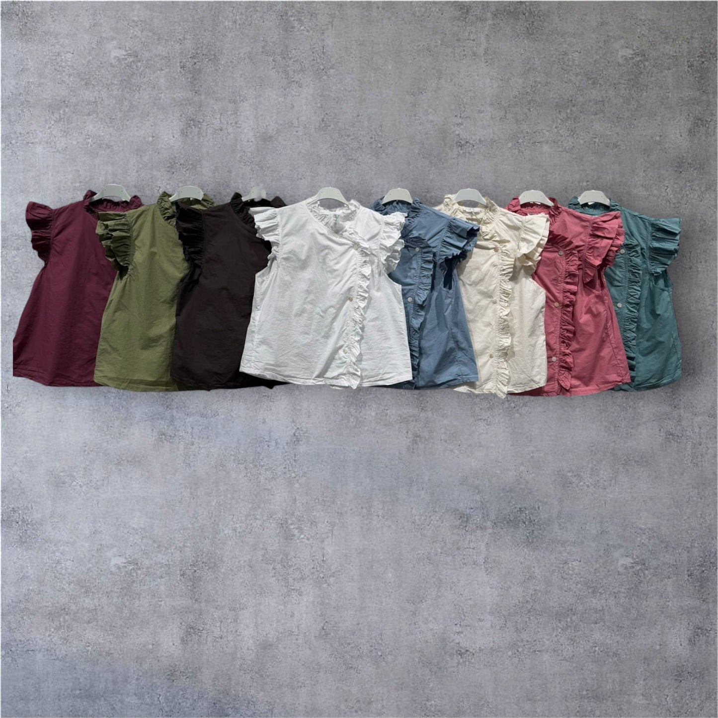 Blusa cierre lateral volante
