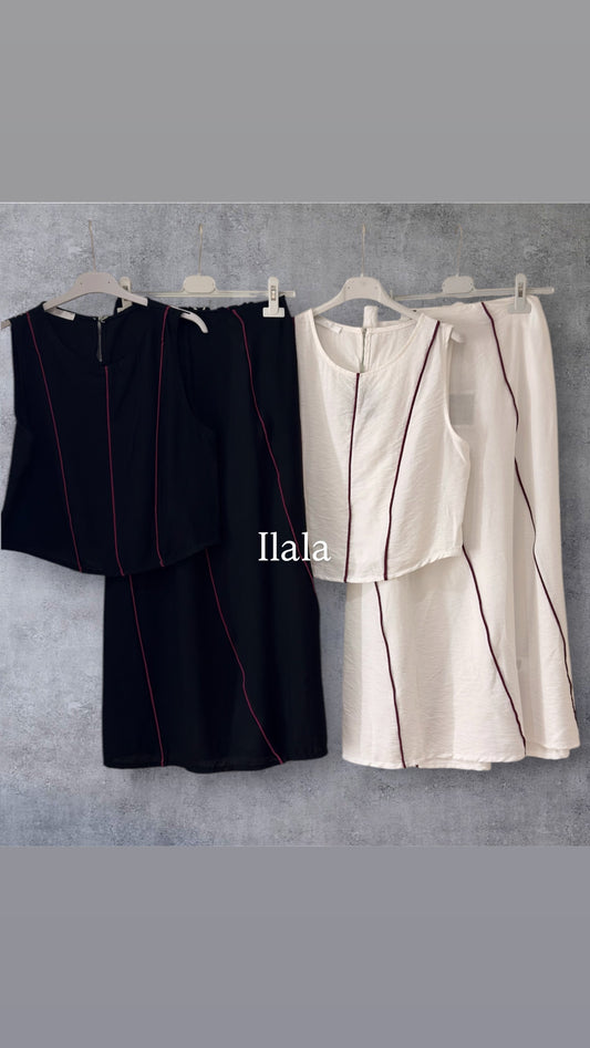 Conjunto Chaleco y falda ribete