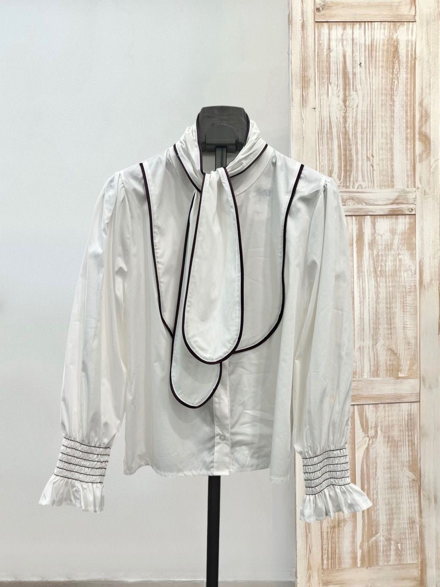 Blusa Lazo ribeteada
