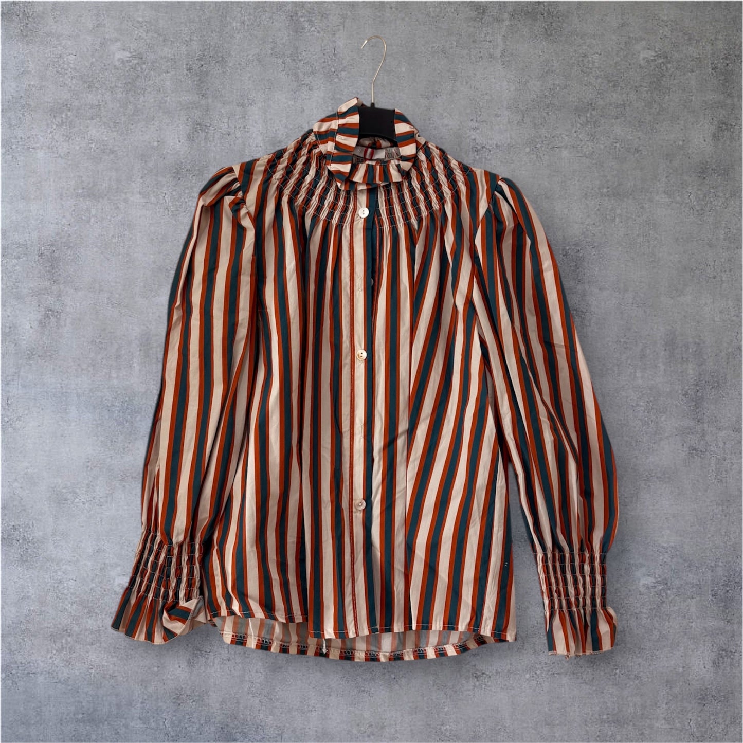 Blusa raya cuello fruncido