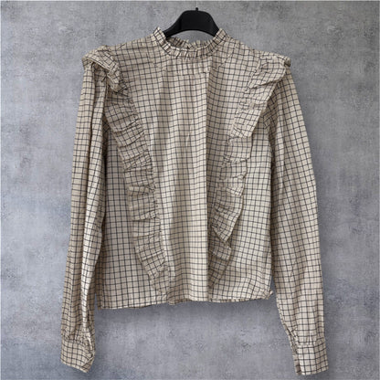 Blusa cuadros volantes